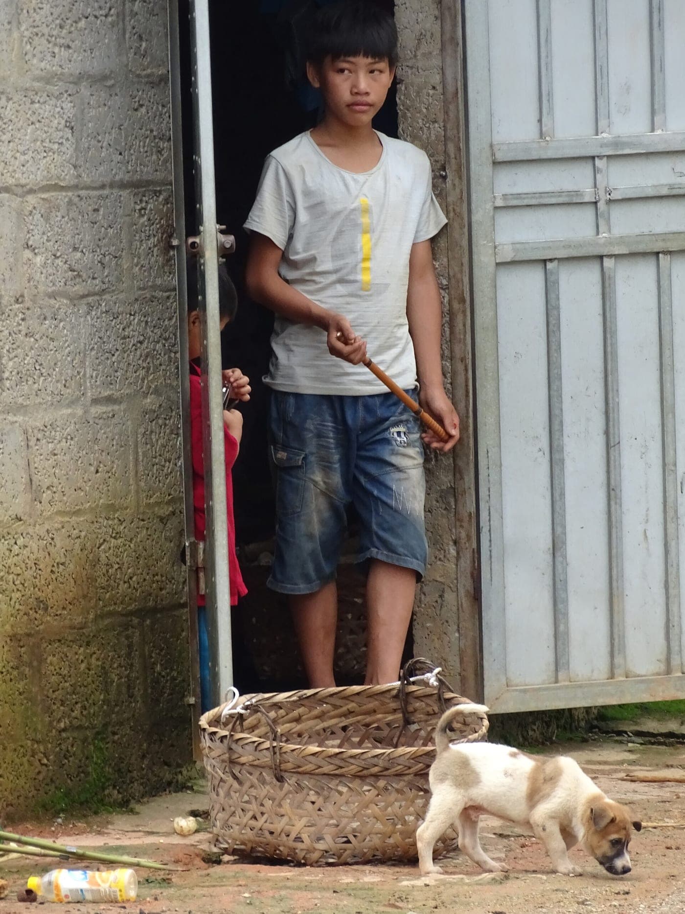 Boy with Dog - Near Nguom Ngao Cave - Cao Bang Province - Vietnam (48119866972)